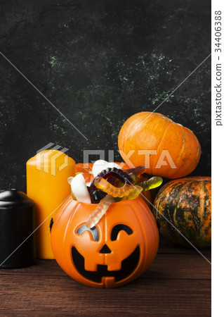 Terrible sweet for Halloween in decorative pumpkin 34406388