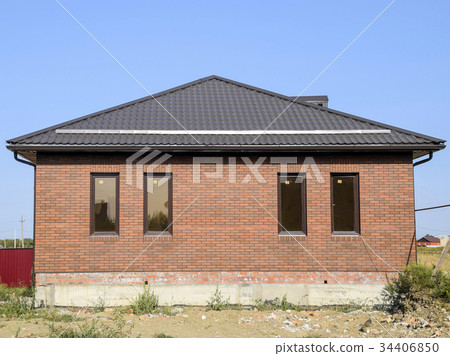 Brown roof and brown brick 34406850