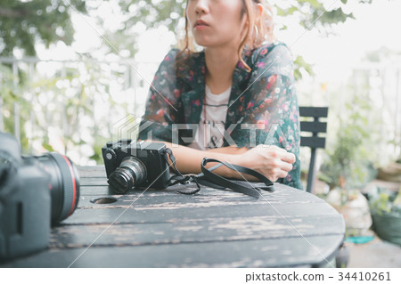 photocamera, photographer, cameraman 34410261