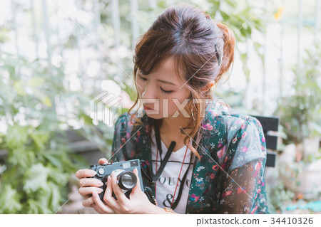 photocamera, photographer, female 34410326