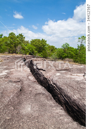 Cracked Prehistory Stone on the Mountain Cracked Prehistory Stone on the Mountain 34412567