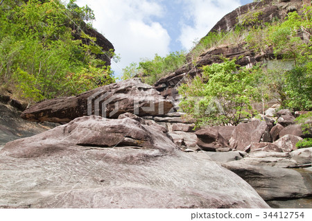 Fish stone and blue sky 34412754