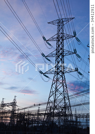 High voltage electricity pillars and blue sky High voltage electricity pillars and blue sky 34412911