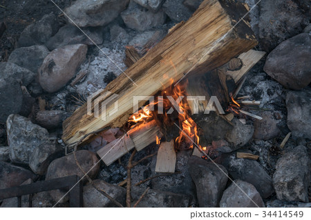Bonfire in a stone fireplace 34414549