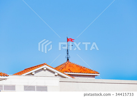 Red roof and blue sky 34415733