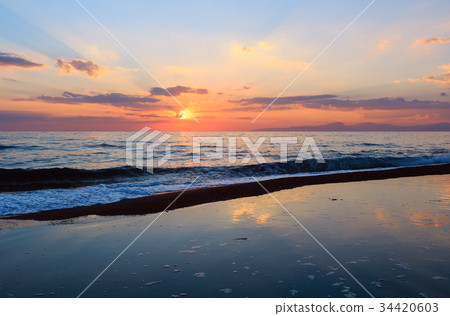Sunset on sea beach 34420603