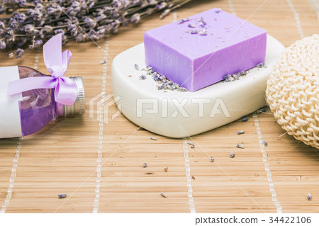 Bar of natural lavandah soap on white soap dish Bar of natural lavandah soap on white soap dish 34422106