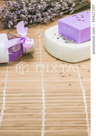 Bar of natural lavandah soap on white soap dish Bar of natural lavandah soap on white soap dish 34422107