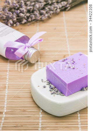 Bar of natural lavandah soap on white soap dish Bar of natural lavandah soap on white soap dish 34422108