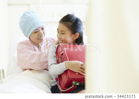 Mother and girl fighting and spending time together in a sickroom 34423171