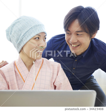 Husband supporting wife who fights illness Husband supporting wife who fights illness 34423408