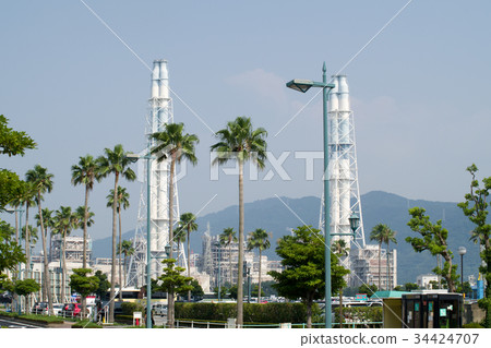 Power plant over palm tree 34424707