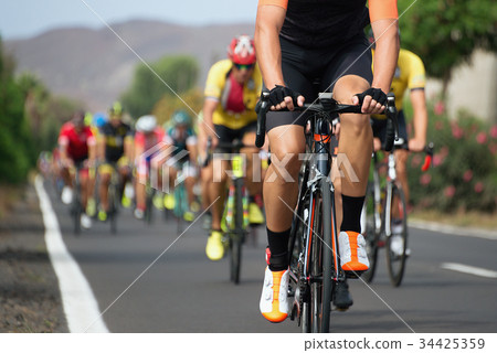 Cycling competition,cyclist athletes riding a race Cycling competition,cyclist athletes riding a race 34425359