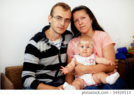 Portrait of young family 34426513