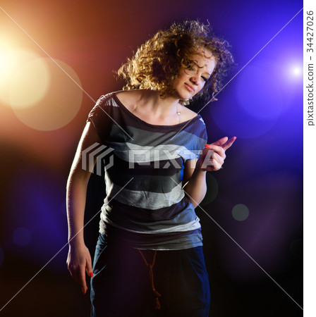 young woman dancing young woman dancing 34427026