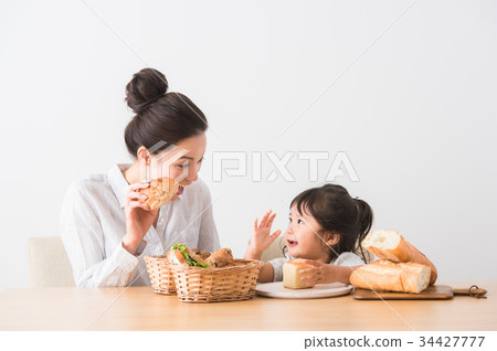 Children and Moms Baking Bread Children and Moms Baking Bread 34427777