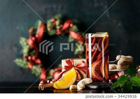 Mulled red wine in holiday composition 34429916