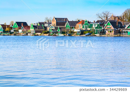 Row of old dutch traditional houses in Zaanse 34429989