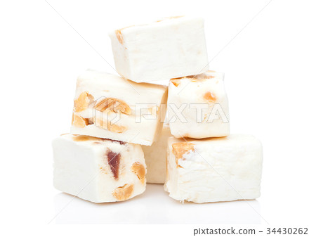 Nut nougat bar traditional sweet candy on white 34430262