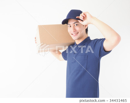 Worker carrying a cardboard box and handing over hat Worker carrying a cardboard box and handing over hat 34431465