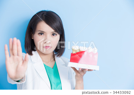 dentist take decay tooth model 34433092