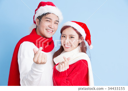 couple smile with merry christmas couple smile with merry christmas 34433155