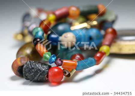 The jewelry from beads and antique gold The jewelry from beads and antique gold 34434755