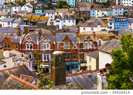 Roofs of buildings covered with green moss 34438414