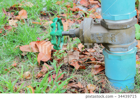Water valve Plumbing Steel on grass. 34439715
