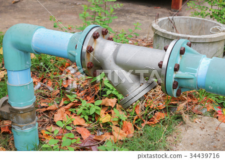 Water valve Plumbing Steel on grass Water valve Plumbing Steel on grass 34439716