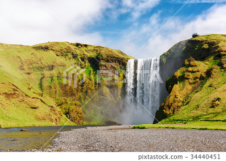 Famous Skogafoss waterfall Famous Skogafoss waterfall 34440451