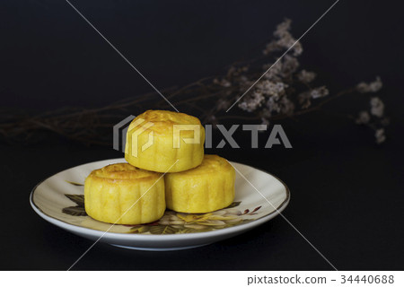 Mid Autumn Festival moon cakes on black background 34440688