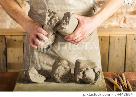 potter, tools, ceramics art concept - macro view 34442694