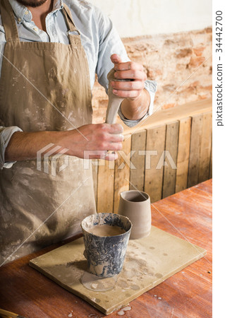 pottery, stoneware, ceramics art concept - close pottery, stoneware, ceramics art concept - close 34442700