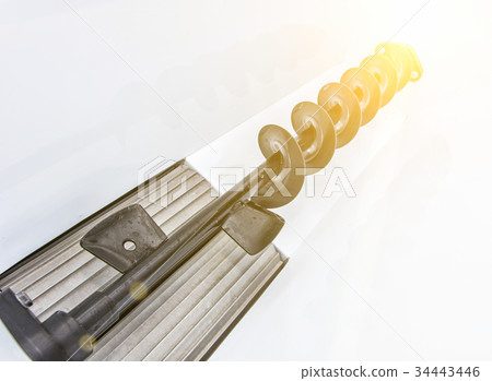 Empty vine press with yellow sun rays 34443446