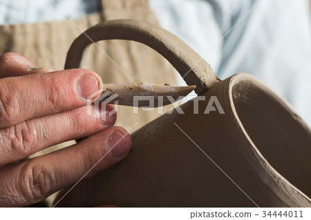 potter, workshop, ceramics art concept - ceramist potter, workshop, ceramics art concept - ceramist 34444011