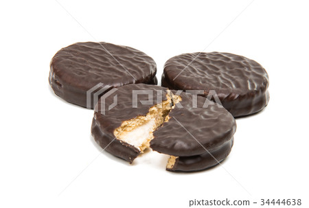 Double cookies in chocolate isolated Double cookies in chocolate isolated 34444638