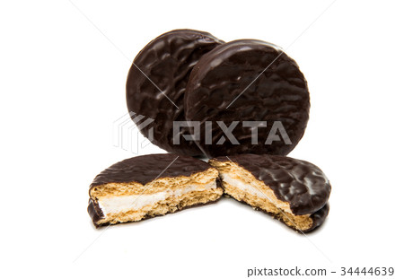 Double cookies in chocolate isolated Double cookies in chocolate isolated 34444639