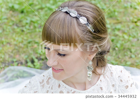 Beautiful bride in white of summer time Beautiful bride in white of summer time 34445932