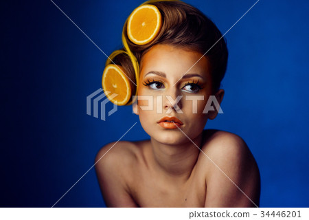 woman with fruit in hair woman with fruit in hair 34446201