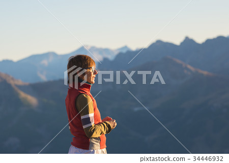 One person looking at the majestic view One person looking at the majestic view 34446932