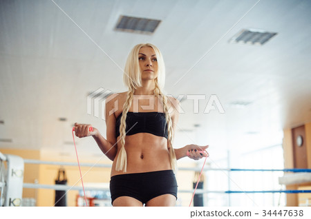Portrait of young female boxer 34447638