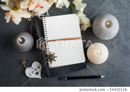 Open blank journal with blossom 34450126