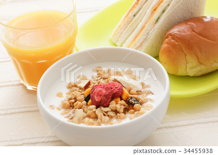 Breakfast yogurt sandwich bread orange juice Breakfast yogurt sandwich bread orange juice 34455938