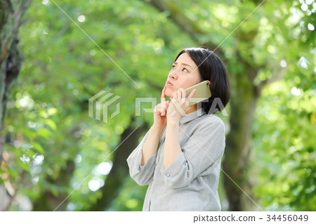 Fresh green middle female smartphone Fresh green middle female smartphone 34456049