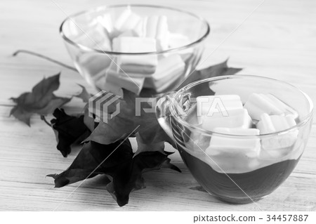 Cacao and marshmallows on wooden background Cacao and marshmallows on wooden background 34457887