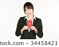 Correspondence to overseas business trips is a business person's essential skill. Business woman holding a passport 34458421