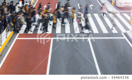 Blur business people are walking across street. Blur business people are walking across street. 34464336