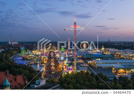 Aerial view of Oktoberfest during sunset in Munich Aerial view of Oktoberfest during sunset in Munich 34464470