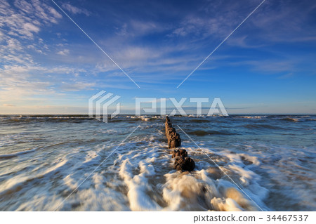 Baltic Sea and the breakwater at dusk Baltic Sea and the breakwater at dusk 34467537
